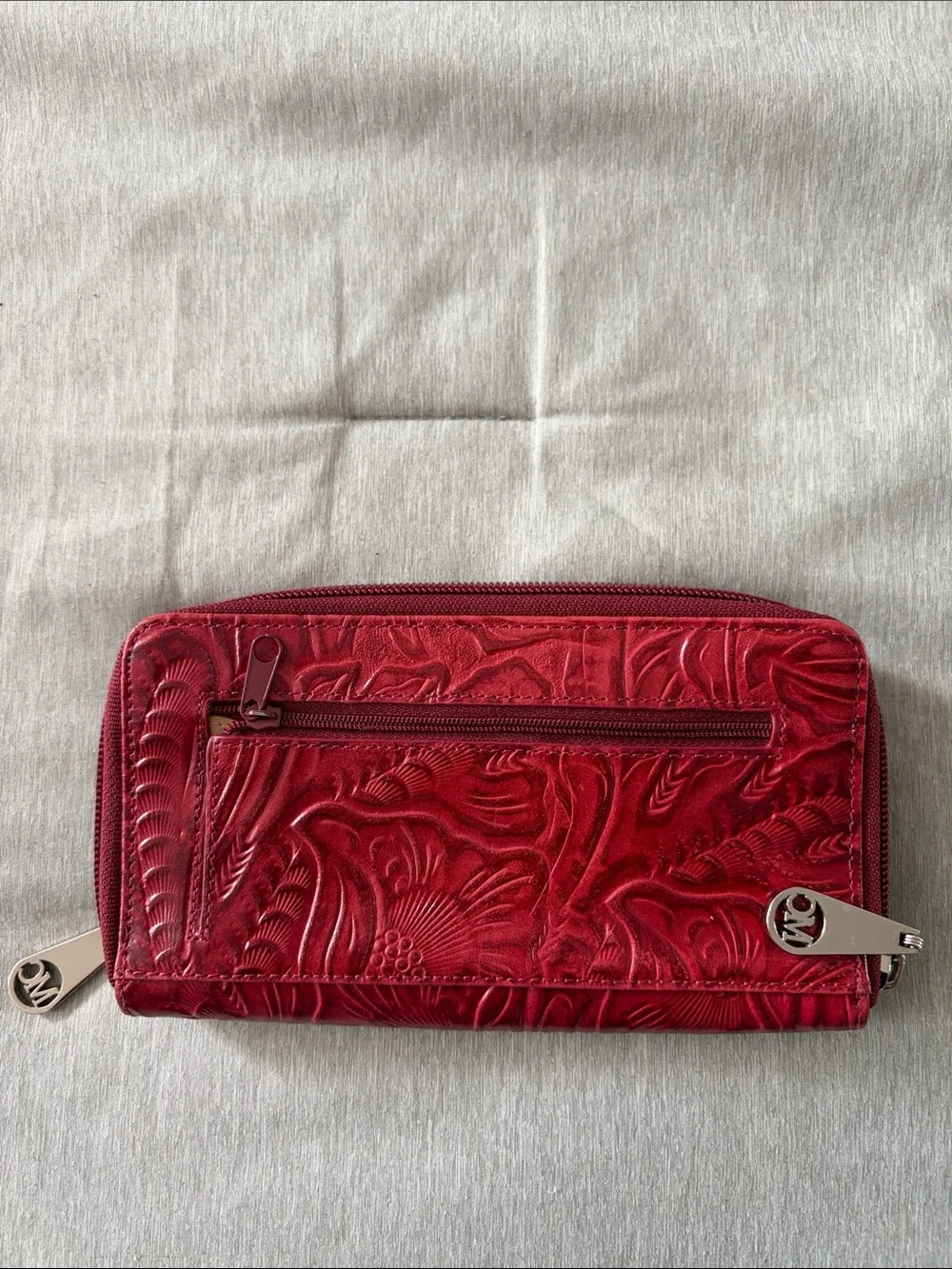Red Embossed Zip-Around Wallet with Ornate Medallion Accent